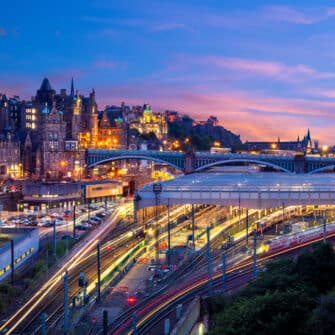 Night,View,Of,Waverley,Station,In,Edinburgh,,Scotland